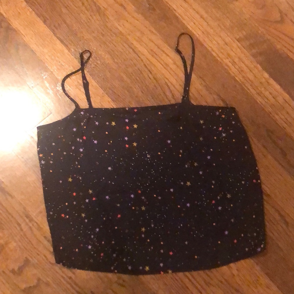Black with stars camisole tank. Adjustable straps.